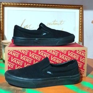 All black vans. (Size 7).